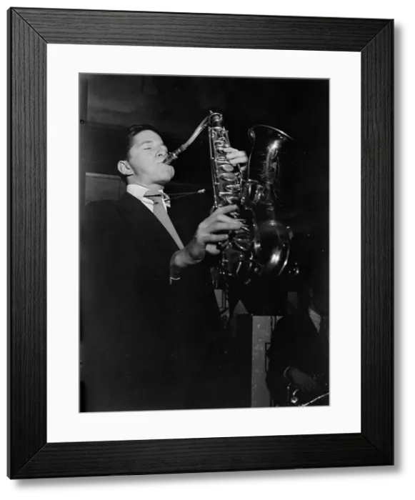 Framed Print : Portrait of Allen Eager, Arcadia Ballroom, New York, N.Y. ca. May 1947. Creator: William Paul Gottlieb Framed Print : Portrait of Allen Eager, Arcadia Ballroom, New York, N.Y. ca. May 1947. Creator: William Paul Gottlieb
