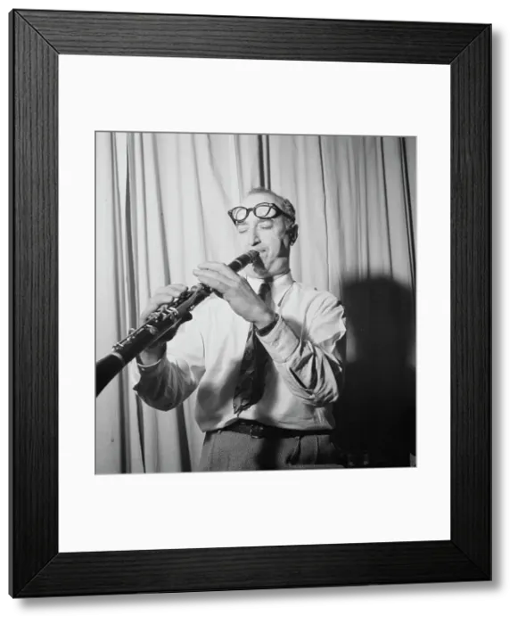 Framed Print : Portrait of Mezz Mezzrow in his office, New York, N.Y. ca. Nov. 1946. Creator: William Paul Gottlieb Framed Print : Portrait of Mezz Mezzrow in his office, New York, N.Y. ca. Nov. 1946. Creator: William Paul Gottlieb