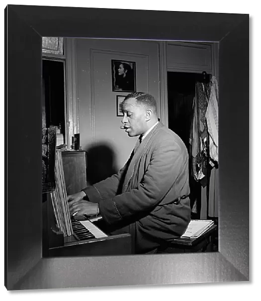 Portrait of Willie Smith in his apartment, Manhattan, New York, N.Y. ca. Jan. 1947. Creator: William Paul Gottlieb