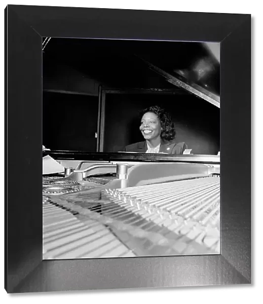 Portrait of Mary Lou Williams, CBS studio, New York, N.Y. ca. Apr. 1947. Creator: William Paul Gottlieb
