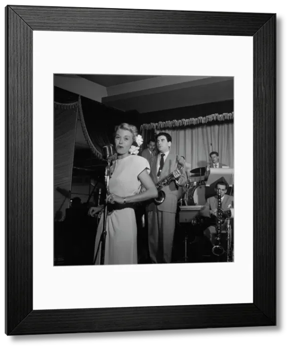 Framed Print : Portrait of June Christy, Georgie Auld, and Red Rodney, Club Troubadour, N.Y. ca. Sept. 1947. Creator: William Paul Gottlieb Framed Print : Portrait of June Christy, Georgie Auld, and Red Rodney, Club Troubadour, N.Y. ca. Sept. 1947. Creator: William Paul Gottlieb