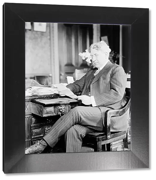 Lindley M. Garrison, Secretary of War, at Desk, 1913. Creator: Harris & Ewing. Lindley M. Garrison, Secretary of War, at Desk, 1913. Creator: Harris & Ewing