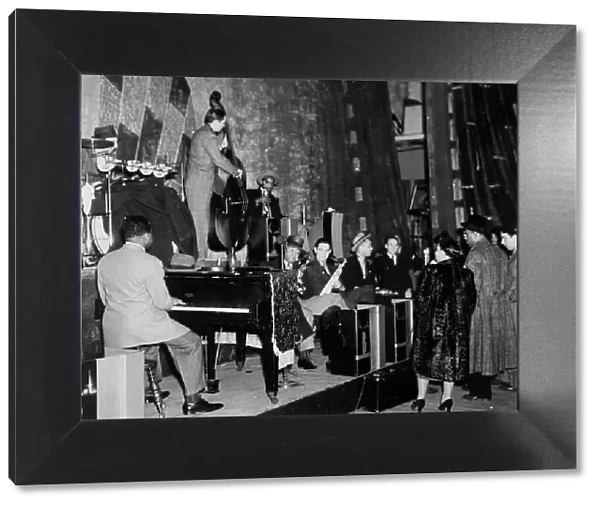 Portrait of Count Basie, Ray Bauduc, Bob Haggart, Harry Edison, Herschel Evans...Washington, c1941. Creator: William Paul Gottlieb