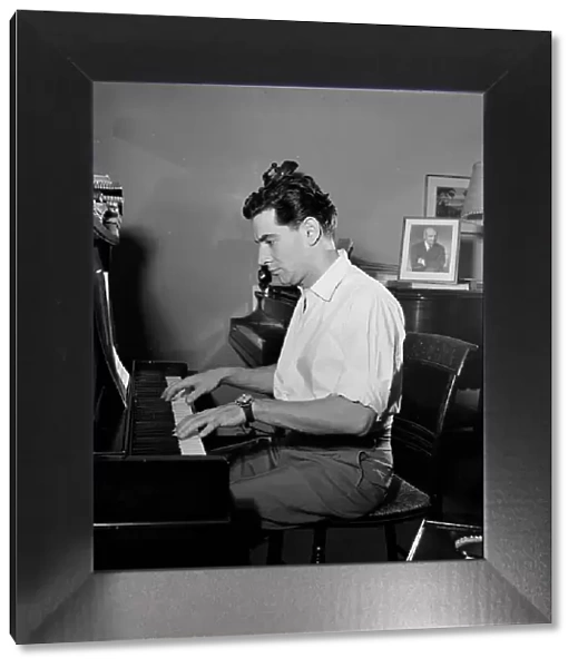 Portrait of Leonard Bernstein in his apartment, New York, N.Y. 1946. Creator: William Paul Gottlieb