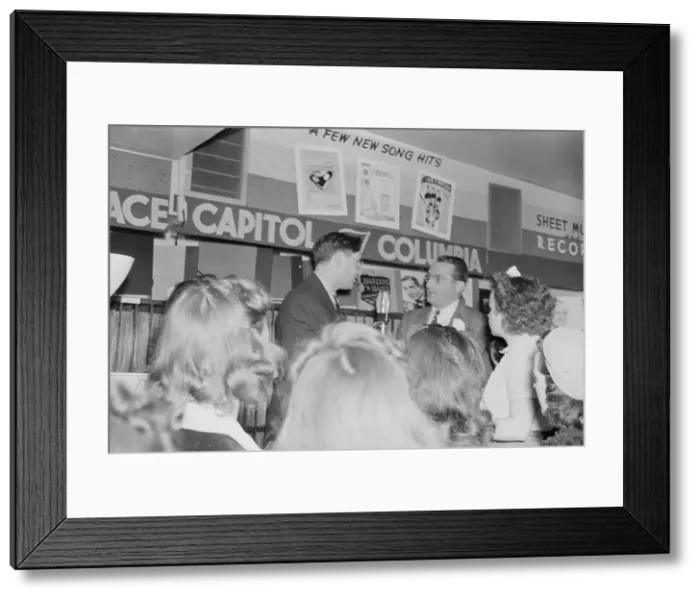 Framed Print : Portrait of Tommy Dorsey and William P. Gottlieb, record store, Washington, D.C. ca. 1940. Creator: Delia Potofsky Gottlieb Framed Print : Portrait of Tommy Dorsey and William P. Gottlieb, record store, Washington, D.C. ca. 1940. Creator: Delia Potofsky Gottlieb