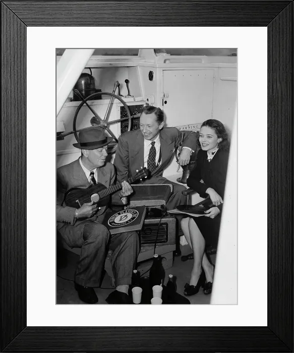 Framed Print : Portrait of Cliff Edwards, Betty Brewer, and Frank... Ukelele Lady (yacht), Hudson River, NY, 1947. Creator: William Paul Gottlieb Framed Print : Portrait of Cliff Edwards, Betty Brewer, and Frank... Ukelele Lady (yacht), Hudson River, NY, 1947. Creator: William Paul Gottlieb