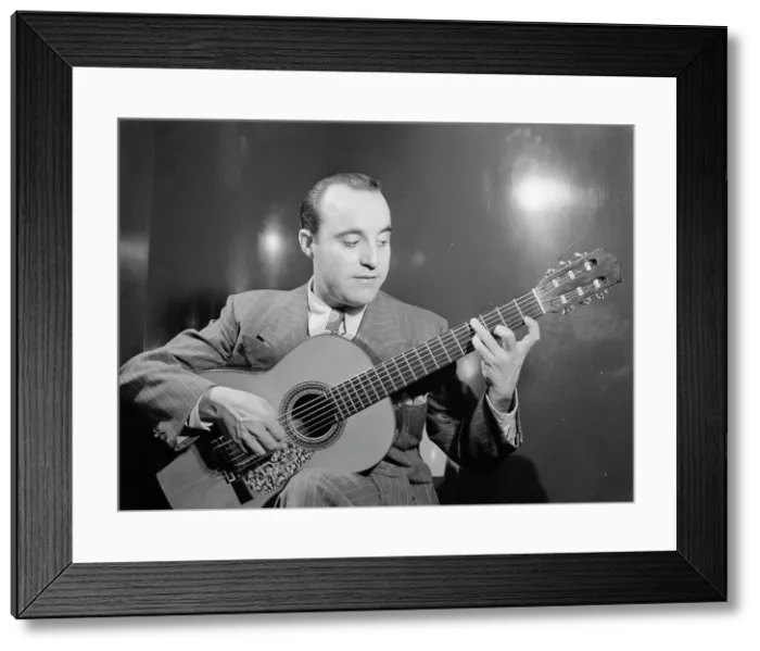 Framed Print : Portrait of Vincente Gomez, Café Society Uptown(?), New York, N.Y. ca. June 1946. Creator: William Paul Gottlieb Framed Print : Portrait of Vincente Gomez, Café Society Uptown(?), New York, N.Y. ca. June 1946. Creator: William Paul Gottlieb