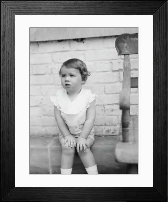 Framed Print : Moseley, F.S. Mr. child of, seated outdoors, 1930 May 24. Creator: Arnold Genthe Framed Print : Moseley, F.S. Mr. child of, seated outdoors, 1930 May 24. Creator: Arnold Genthe