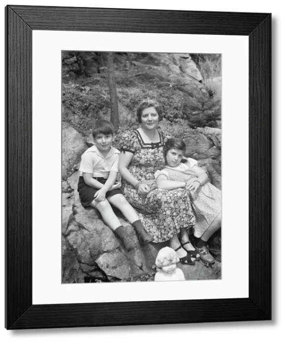 Framed Print : Javits, Benjamin, Mrs. and children, seated oudoors, ca. 1935. Creator: Arnold Genthe Framed Print : Javits, Benjamin, Mrs. and children, seated oudoors, ca. 1935. Creator: Arnold Genthe