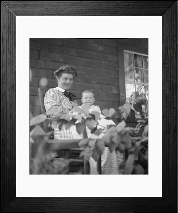 Framed Print : Unidentified woman and baby, seated on porch, between 1911 and 1942. Creator: Arnold Genthe Framed Print : Unidentified woman and baby, seated on porch, between 1911 and 1942. Creator: Arnold Genthe