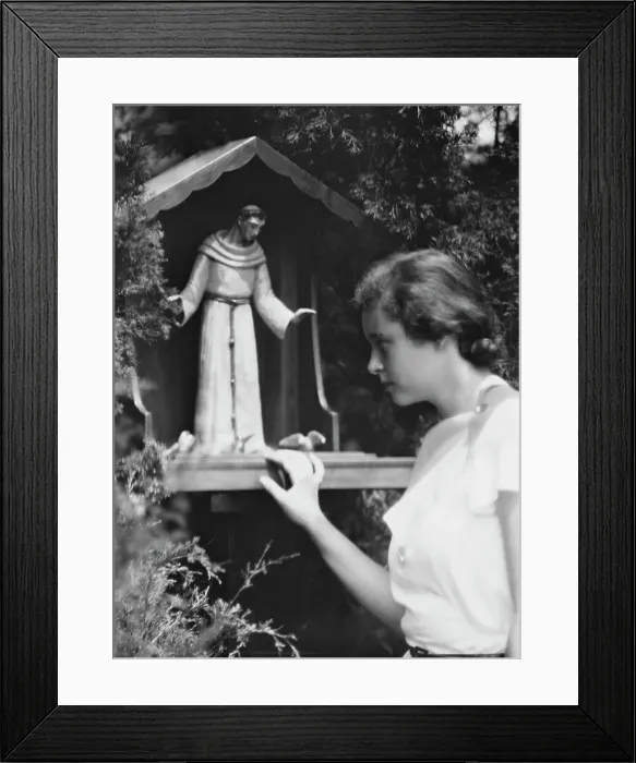Framed Print : Brady, Victoria, Miss, with a statue of St. Francis in a garden, 1931 July 14. Creator: Arnold Genthe Framed Print : Brady, Victoria, Miss, with a statue of St. Francis in a garden, 1931 July 14. Creator: Arnold Genthe