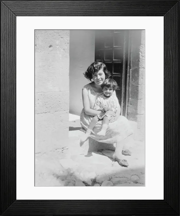 Framed Print : Cenerini, Mrs. and child, seated on a doorstep, 1929 Creator: Arnold Genthe Framed Print : Cenerini, Mrs. and child, seated on a doorstep, 1929 Creator: Arnold Genthe