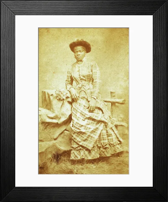 Framed Print : Portrait of unidentified young woman in plaid dress and hat, c1880-c1889. Creator: Thomas Gates Framed Print : Portrait of unidentified young woman in plaid dress and hat, c1880-c1889. Creator: Thomas Gates