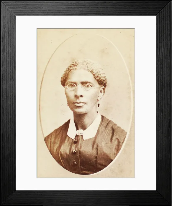 Framed Print : Studio portrait of woman wearing glasses and cross-shaped earrings, c1880-c1889. Creator: George Daniels Morse Framed Print : Studio portrait of woman wearing glasses and cross-shaped earrings, c1880-c1889. Creator: George Daniels Morse
