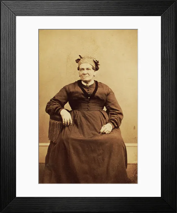 Framed Print : Portrait of seated woman wearing a headwrap, c1870. Creator: Thomas M Saurman Framed Print : Portrait of seated woman wearing a headwrap, c1870. Creator: Thomas M Saurman
