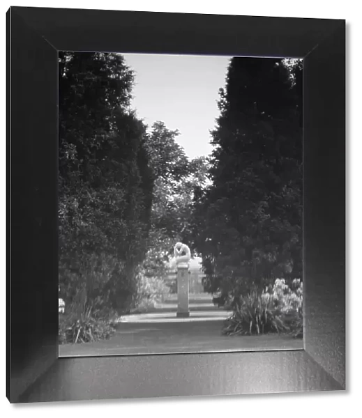 Statue by Paul Manship in the Griffin or Nissen Garden, 1931 June 14. Creator: Arnold Genthe