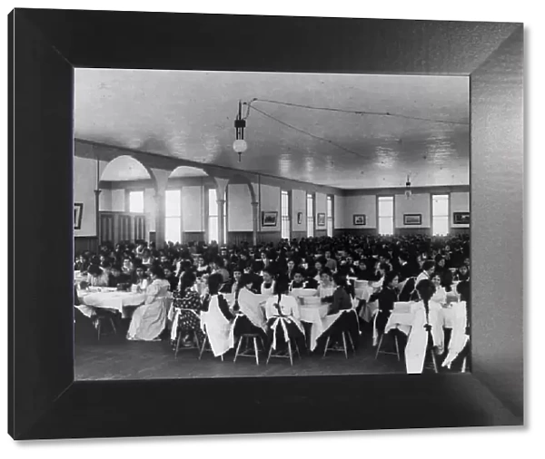 Students in dining hall, United States Indian School, Carlisle, Pa. 1901. Creator: Frances Benjamin Johnston