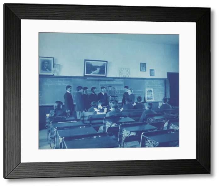 Framed Print : Conversation lesson, subject - the chair, 1901. Creator: Frances Benjamin Johnston Framed Print : Conversation lesson, subject - the chair, 1901. Creator: Frances Benjamin Johnston
