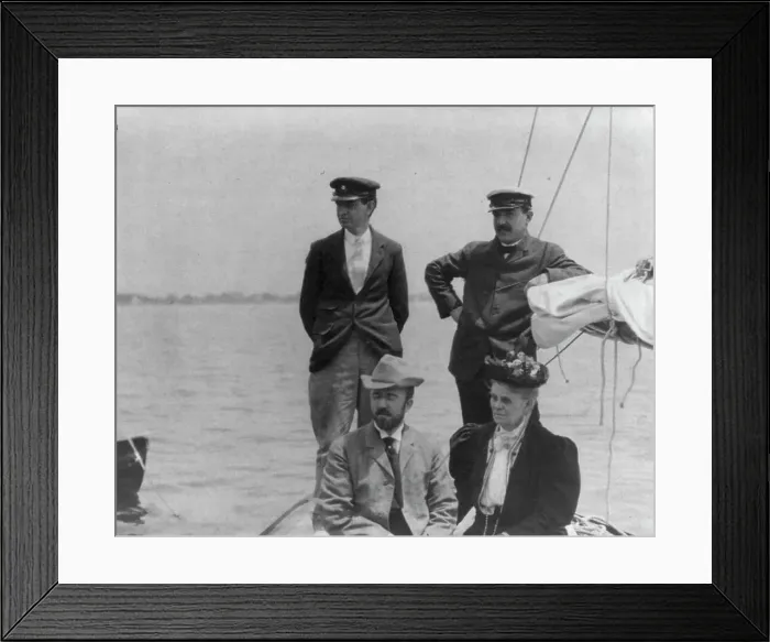 Framed Print : New York Yacht Club, Oyster Bay, L.I. 1905: 2 men with man and woman watching yacht race, 1905. Creator: Frances Benjamin Johnston Framed Print : New York Yacht Club, Oyster Bay, L.I. 1905: 2 men with man and woman watching yacht race, 1905. Creator: Frances Benjamin Johnston