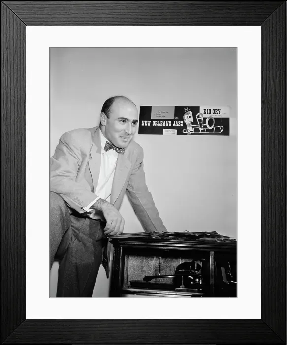 Framed Print : Portrait of George Avakian in his office or home, New York, N.Y.(?), 1938. Creator: William Paul Gottlieb Framed Print : Portrait of George Avakian in his office or home, New York, N.Y.(?), 1938. Creator: William Paul Gottlieb