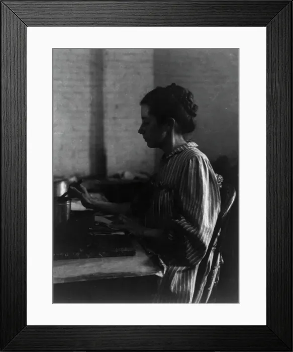 Framed Print : Shoe factories, Lynn, Mass.: woman seated at table, working in shoe factory, (1895?). Creator: Frances Benjamin Johnston Framed Print : Shoe factories, Lynn, Mass.: woman seated at table, working in shoe factory, (1895?). Creator: Frances Benjamin Johnston
