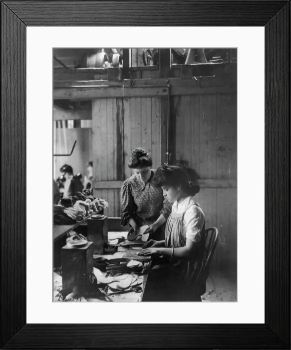 Framed Print : Shoe factories, Lynn, Mass.: 2 women working in shoe factory, (1895?). Creator: Frances Benjamin Johnston Framed Print : Shoe factories, Lynn, Mass.: 2 women working in shoe factory, (1895?). Creator: Frances Benjamin Johnston
