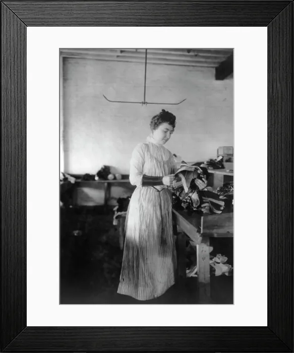 Framed Print : Woman distributing work in a shoe factory, Lynn, Mass. (1895?). Creator: Frances Benjamin Johnston Framed Print : Woman distributing work in a shoe factory, Lynn, Mass. (1895?). Creator: Frances Benjamin Johnston