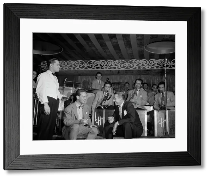 Framed Print : Portrait of Sam Donahue, Stan Kenton, Nick Callonus, and Hep, Aquarium, New York, N.Y. c.Dec. 1946. Creator: William Paul Gottlieb Framed Print : Portrait of Sam Donahue, Stan Kenton, Nick Callonus, and Hep, Aquarium, New York, N.Y. c.Dec. 1946. Creator: William Paul Gottlieb