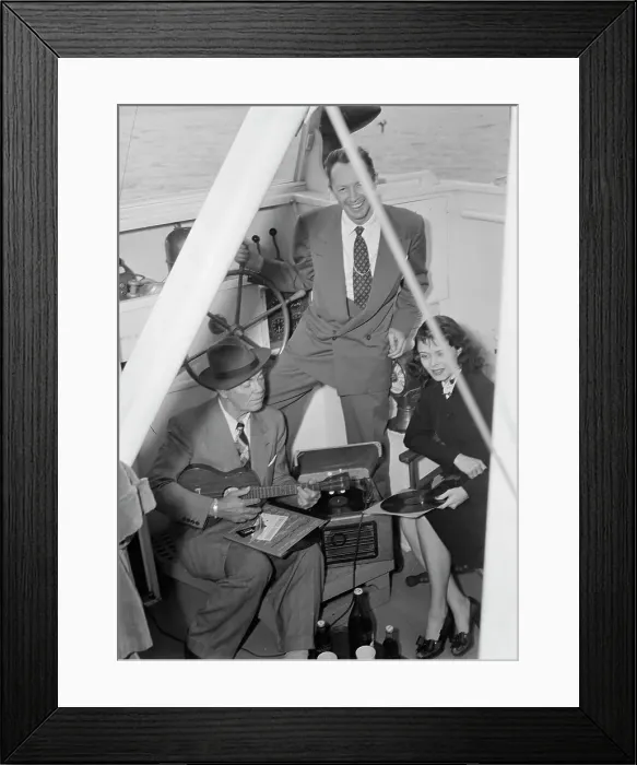 Framed Print : Portrait of Cliff Edwards, Betty Brewer, and Frank...Ukelele Lady (yacht), Hudson River, N.Y. 1947. Creator: William Paul Gottlieb Framed Print : Portrait of Cliff Edwards, Betty Brewer, and Frank...Ukelele Lady (yacht), Hudson River, N.Y. 1947. Creator: William Paul Gottlieb