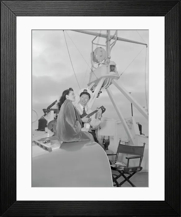 Framed Print : Portrait of Frank Raye and Betty Brewer, Ukelele Lady (yacht), Hudson River, N.Y. ca. June 1947. Creator: William Paul Gottlieb Framed Print : Portrait of Frank Raye and Betty Brewer, Ukelele Lady (yacht), Hudson River, N.Y. ca. June 1947. Creator: William Paul Gottlieb