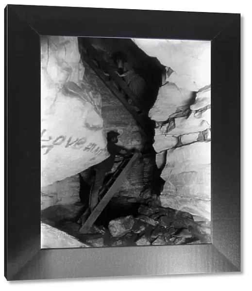 'The Corkscrew' (narrow upward passage), Mammoth Cave, Edmondson County, Kentucky, c1891. Creator: Frances Benjamin Johnston. 'The Corkscrew' (narrow upward passage), Mammoth Cave, Edmondson County, Kentucky, c1891