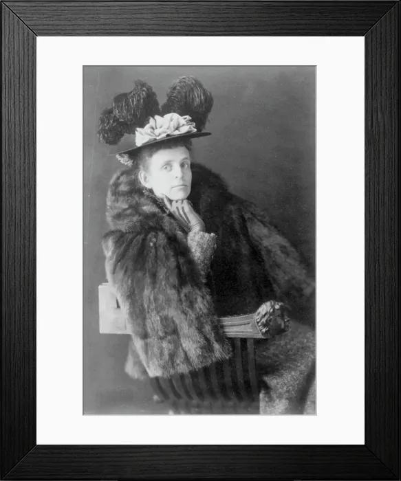 Framed Print : Frances Benjamin Johnston, 1864-1952, half length, seated, facing right, wearing fur jack... 1890s. Creator: Frances Benjamin Johnston