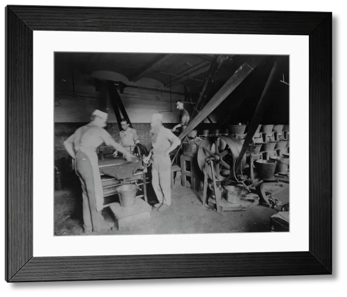 Framed Print : Workers grinding and processing the ink used to print paper money at the Bureau of Engrav... c1890. Creator: Frances Benjamin Johnston Framed Print : Workers grinding and processing the ink used to print paper money at the Bureau of Engrav... c1890. Creator: Frances Benjamin Johnston