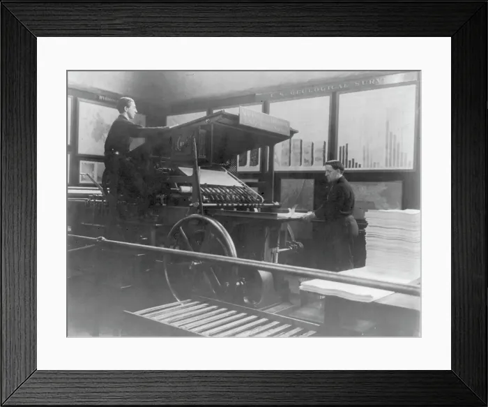 Framed Print : 2 men operating map printing press at U.S. Geol. Survey, (1900?). Creator: Frances Benjamin Johnston Framed Print : 2 men operating map printing press at U.S. Geol. Survey, (1900?). Creator: Frances Benjamin Johnston