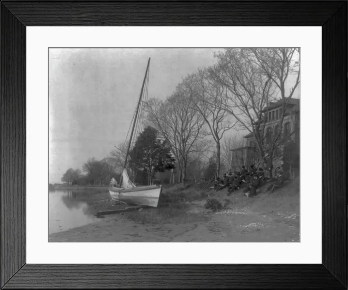 Framed Print : Hampton Institute students sketching a fishing boat at river bank. Hampton, Va. 1900. Creator: Frances Benjamin Johnston Framed Print : Hampton Institute students sketching a fishing boat at river bank. Hampton, Va. 1900. Creator: Frances Benjamin Johnston