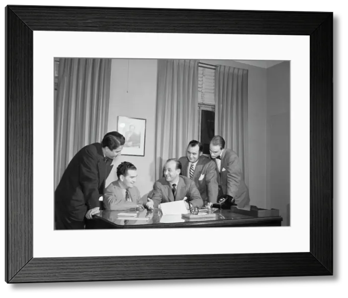 Framed Print : Portrait of Joe Mooney and Milt Gabler(?), Decca office(?), New York, N.Y. ca. Dec. 1946. Creator: William Paul Gottlieb Framed Print : Portrait of Joe Mooney and Milt Gabler(?), Decca office(?), New York, N.Y. ca. Dec. 1946. Creator: William Paul Gottlieb