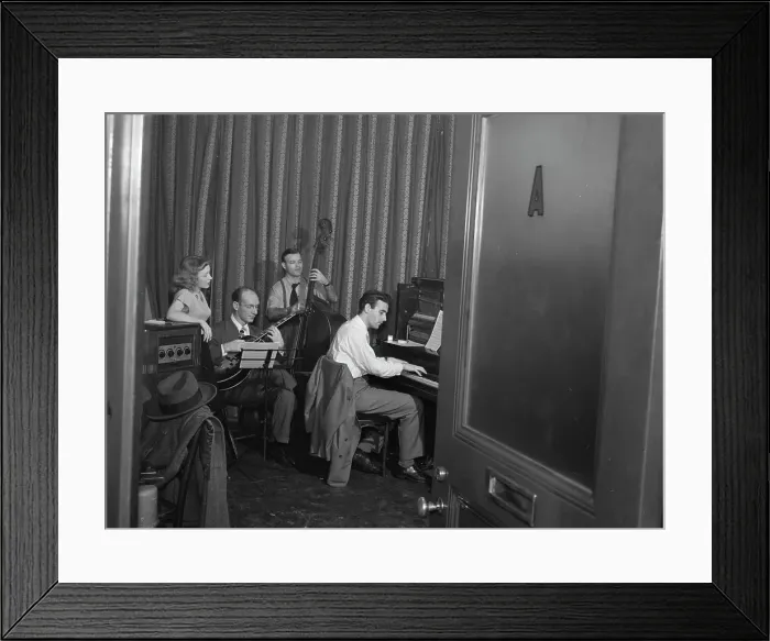 Framed Print : Portrait of Helen Carr, Sammy Herman, Joe Bianco, and Donn Trenner, Nola's, N.Y. ca. Feb. 1947. Creator: William Paul Gottlieb Framed Print : Portrait of Helen Carr, Sammy Herman, Joe Bianco, and Donn Trenner, Nola's, N.Y. ca. Feb. 1947. Creator: William Paul Gottlieb