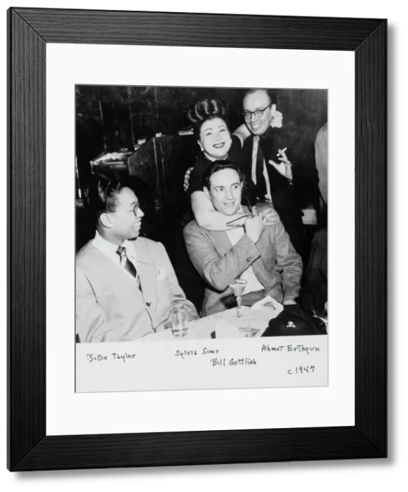 Framed Print : Portrait of Billy Taylor, Sylvia Syms, William P. Gottlieb, and Ahmet M. Ertegun, N.Y. ca. 1947. Creator: Delia Potofsky Gottlieb Framed Print : Portrait of Billy Taylor, Sylvia Syms, William P. Gottlieb, and Ahmet M. Ertegun, N.Y. ca. 1947. Creator: Delia Potofsky Gottlieb