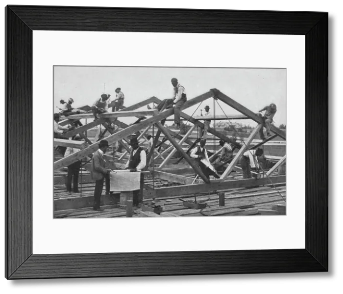 Framed Print : Students framing the roof of a large building, 1904. Creator: Frances Benjamin Johnston Framed Print : Students framing the roof of a large building, 1904. Creator: Frances Benjamin Johnston