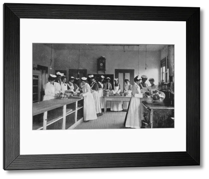 Framed Print : Class in cooking, 1904. Creator: Frances Benjamin Johnston Framed Print : Class in cooking, 1904. Creator: Frances Benjamin Johnston