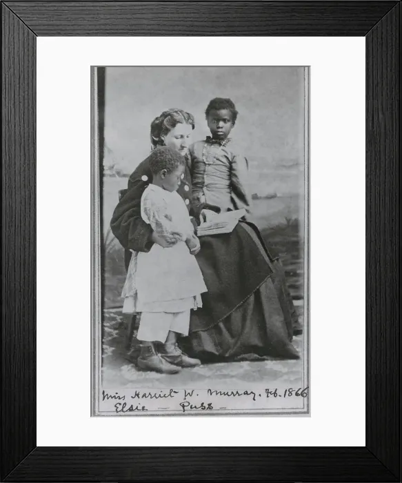 Framed Print : Portrait of Sea Island School teacher Miss Harriet W. Murray, with students Elsie and Puss, 1866-02. Creator: Unknown Framed Print : Portrait of Sea Island School teacher Miss Harriet W. Murray, with students Elsie and Puss, 1866-02. Creator: Unknown