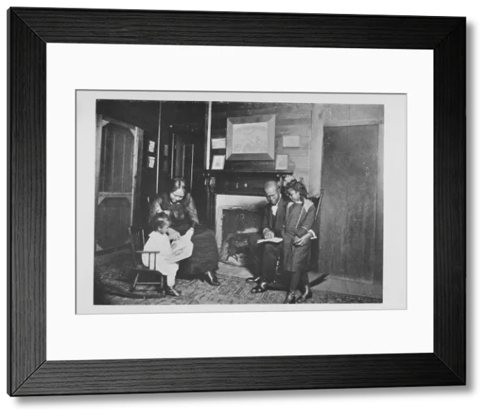 Framed Print : An African American family; Reading books, 1922. Creator: Unknown Framed Print : An African American family; Reading books, 1922. Creator: Unknown