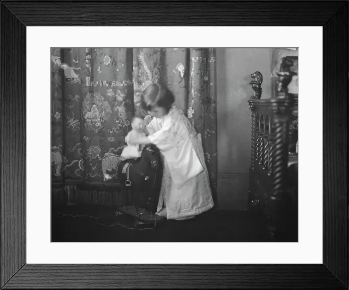 Framed Print : Rice, Isaac, Mrs. grandaughter of, playing with a doll, 1920 May 27. Creator: Arnold Genthe Framed Print : Rice, Isaac, Mrs. grandaughter of, playing with a doll, 1920 May 27. Creator: Arnold Genthe