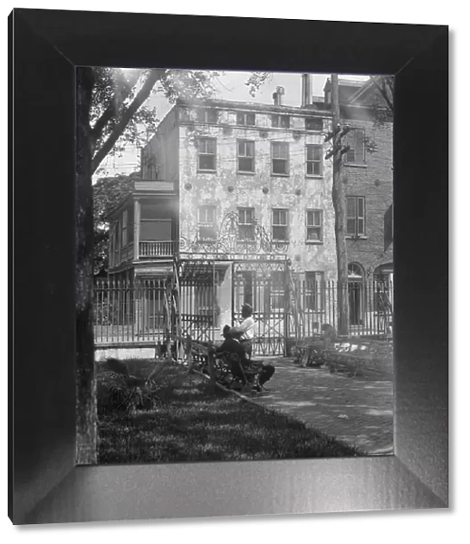 Park and houses, [36 Chalmers Street through Washington Park Gate], Charleston, South... c1920-1926 Creator: Arnold Genthe
