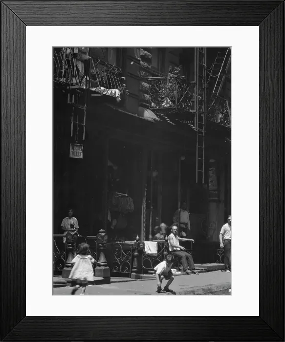 Framed Print : Street scene in an American city, between 1896 and 1942. Creator: Arnold Genthe Framed Print : Street scene in an American city, between 1896 and 1942. Creator: Arnold Genthe