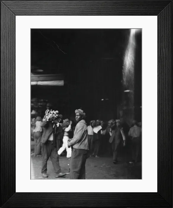 Framed Print : Unloading bananas, New Orleans, between 1920 and 1926. Creator: Arnold Genthe Framed Print : Unloading bananas, New Orleans, between 1920 and 1926. Creator: Arnold Genthe