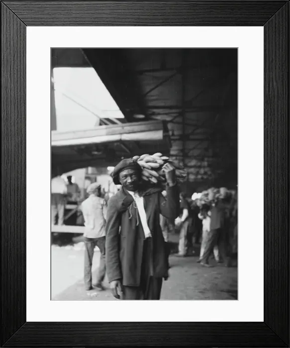 Framed Print : Unloading bananas, New Orleans, between 1920 and 1926. Creator: Arnold Genthe Framed Print : Unloading bananas, New Orleans, between 1920 and 1926. Creator: Arnold Genthe