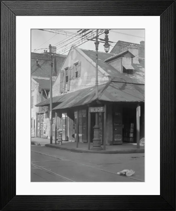 Framed Print : Corner store in the French Quarter, New Orleans, between 1920 and 1926. Creator: Arnold Genthe Framed Print : Corner store in the French Quarter, New Orleans, between 1920 and 1926. Creator: Arnold Genthe
