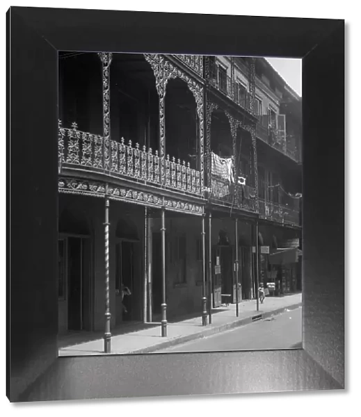 Street scene in the French Quarter, New Orleans, between 1920 and 1926. Creator: Arnold Genthe