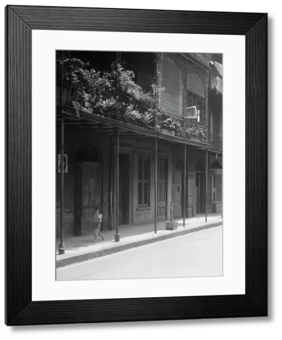 Framed Print : Street scene, New Orleans, between 1920 and 1926. Creator: Arnold Genthe Framed Print : Street scene, New Orleans, between 1920 and 1926. Creator: Arnold Genthe
